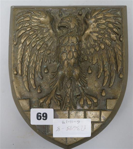 A brass eagle plaque